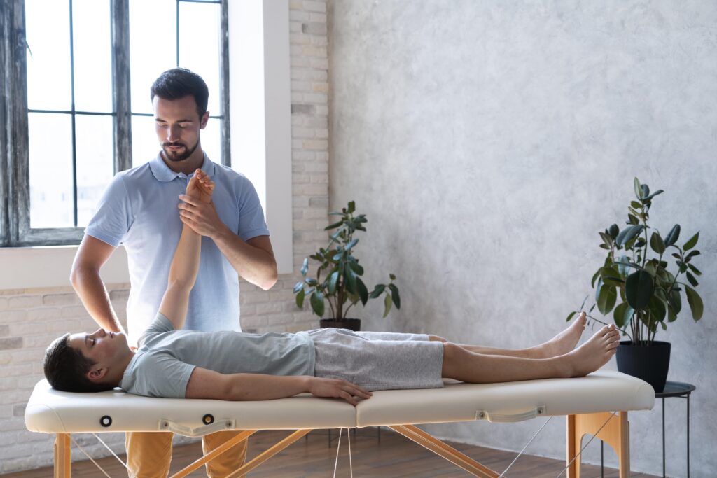 medium-shot-physiotherapist-helping-patient.jpg